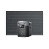 EcoFlow DELTA 2 Max solar power station positioned in front of a rigid rooftop solar panel