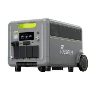 Front angle view of the FOSSiBOT F3600 Pro portable power station showing its sturdy gray body, heavy-duty wheels, control panel, and green accent handle.